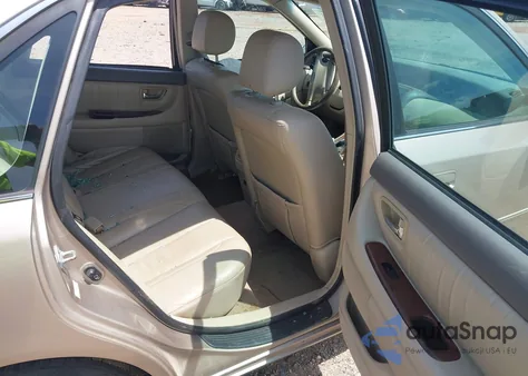 2001 Toyota Avalon Xls z USA, uszkodzony, nr VIN 4T1BF28B51U151222